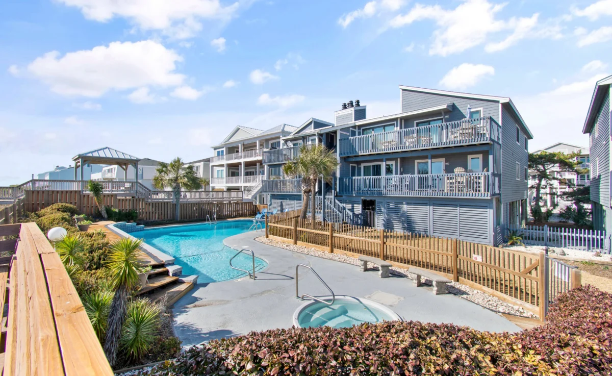 Island Club B3 front of building with pool