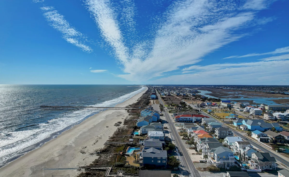 Aerial view looking down at the beach at Ocean Isle Beach