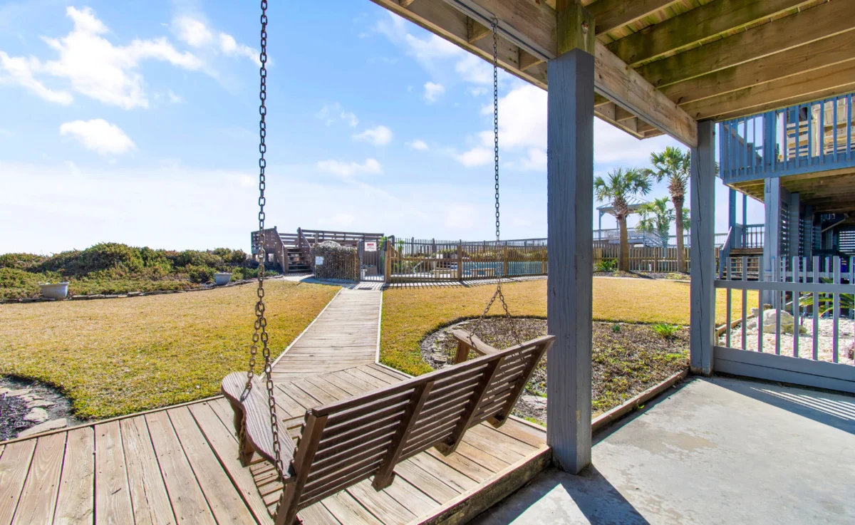 Porch swing with boardwalk to beach access